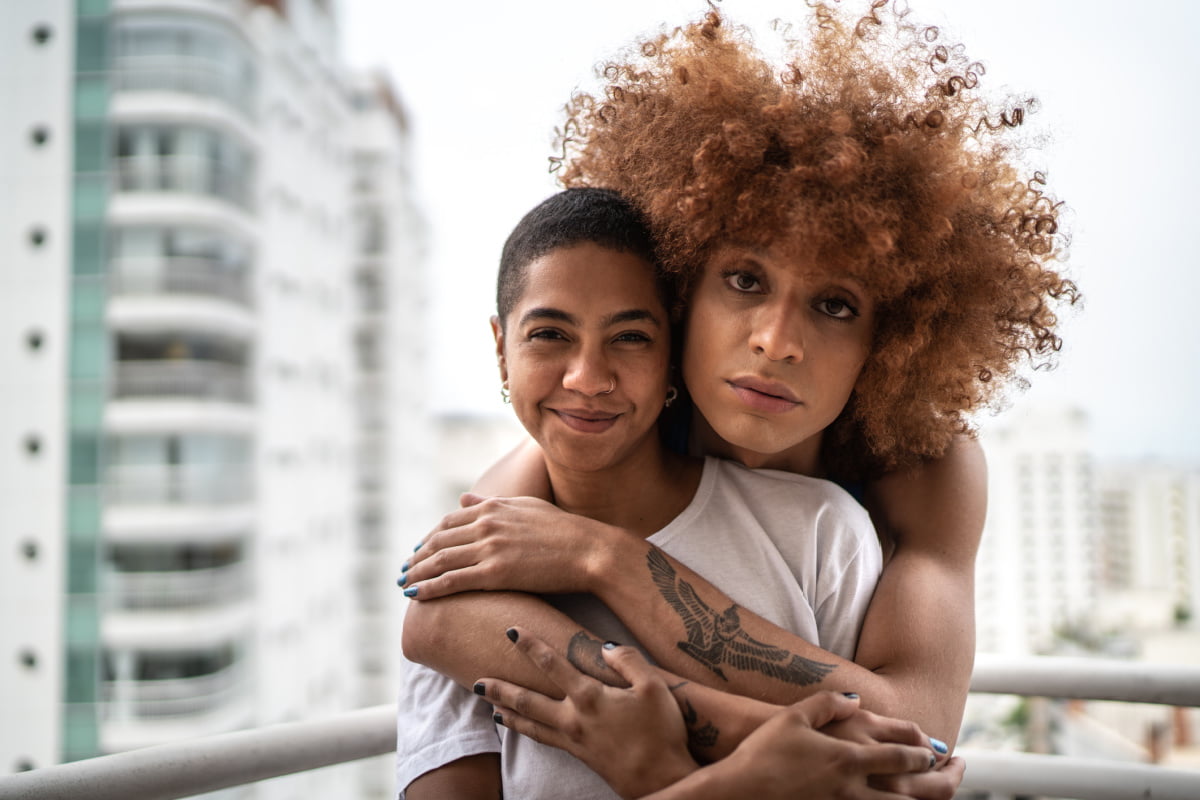 A Transgender Man and Woman Embrace Following Gender Affirmation Surgery