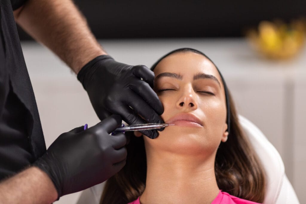 Woman getting lip fillers